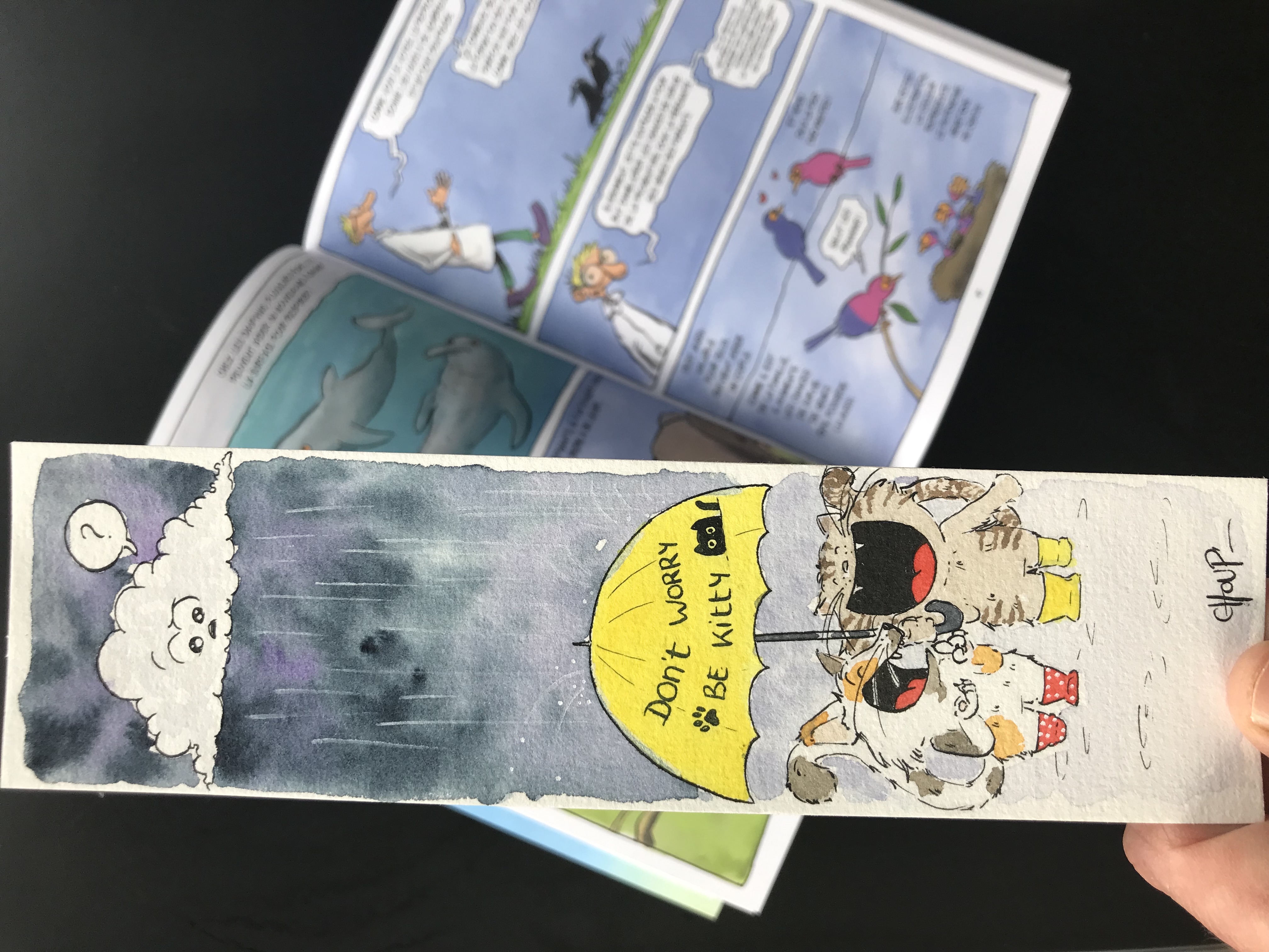 Marque page représentant deux chats sous un parapluie
