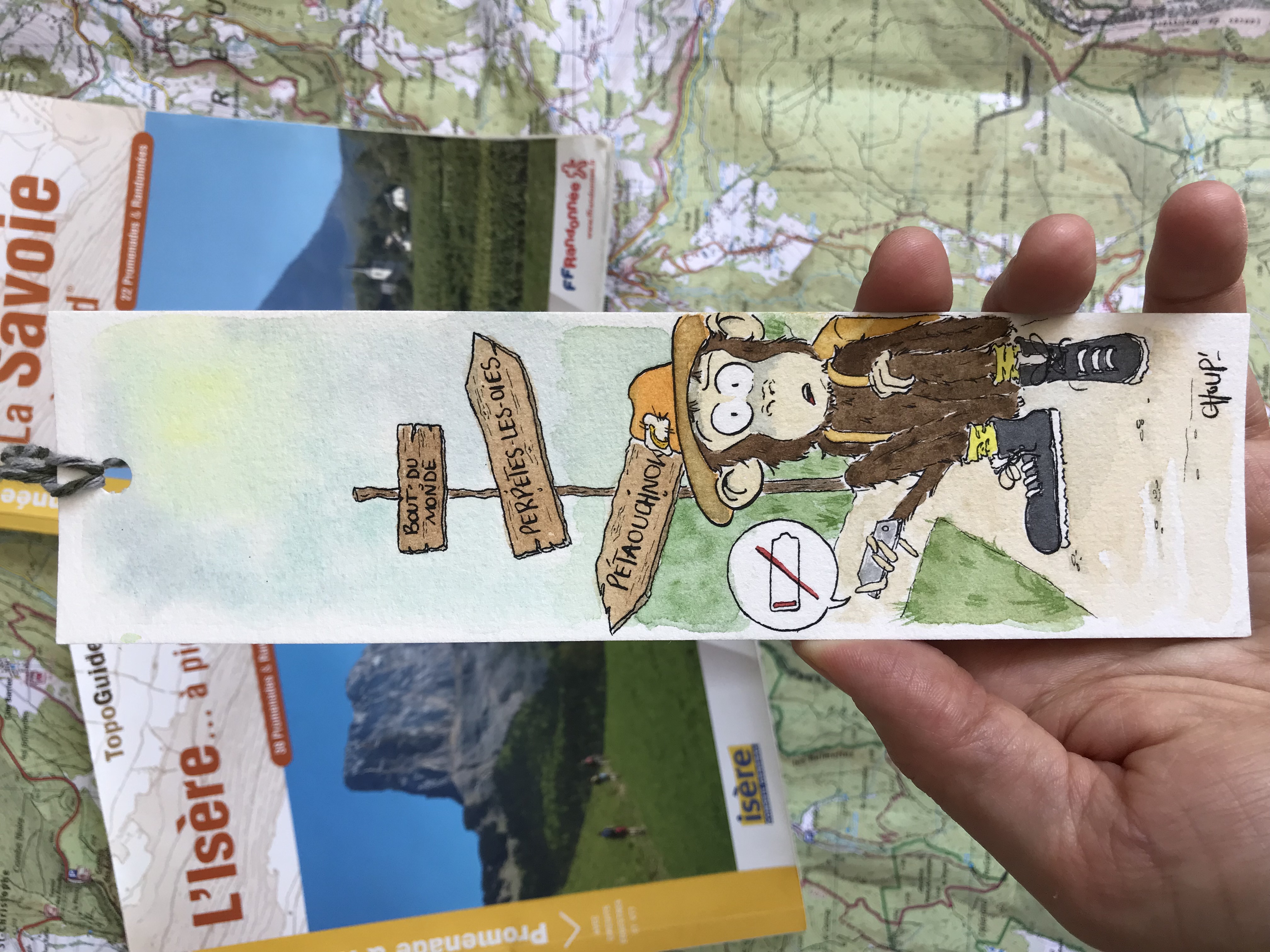 Marque page représentant un singe qui fait de la randonnée